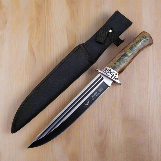 Knife with decorative handle and sheath on a wooden surface
