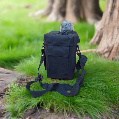 Water bottle surrounded by grass 