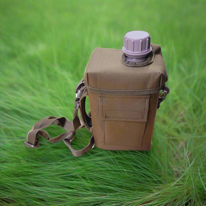 Water bottle surrounded by grass 