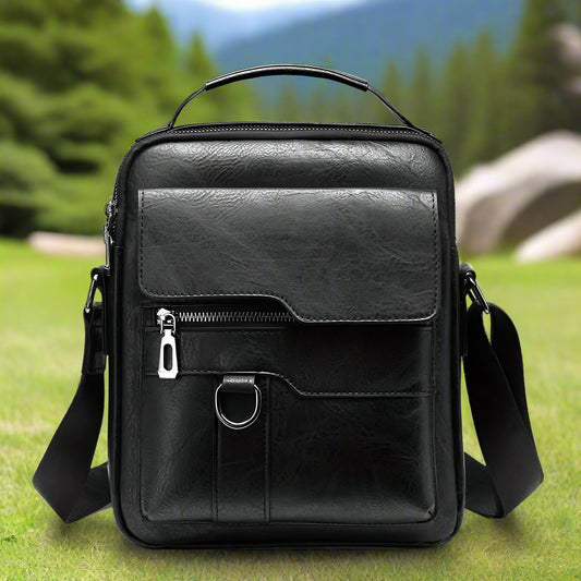 Black leather crossbody bag on a white background