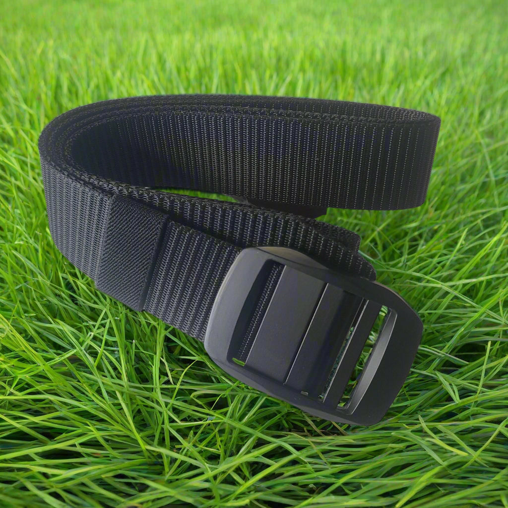 Black belt with a buckle on a light gray background