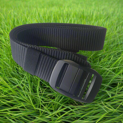 Black belt with a buckle on a light gray background