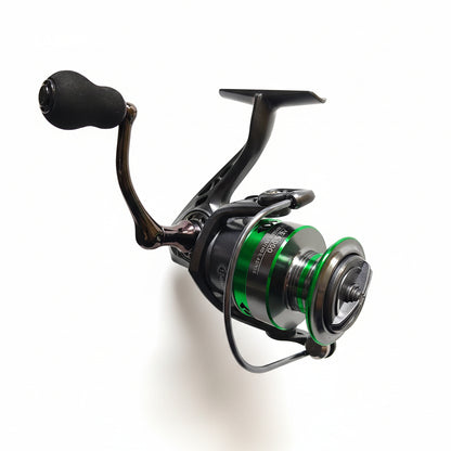 Fishing reel with green accents on a textured white background