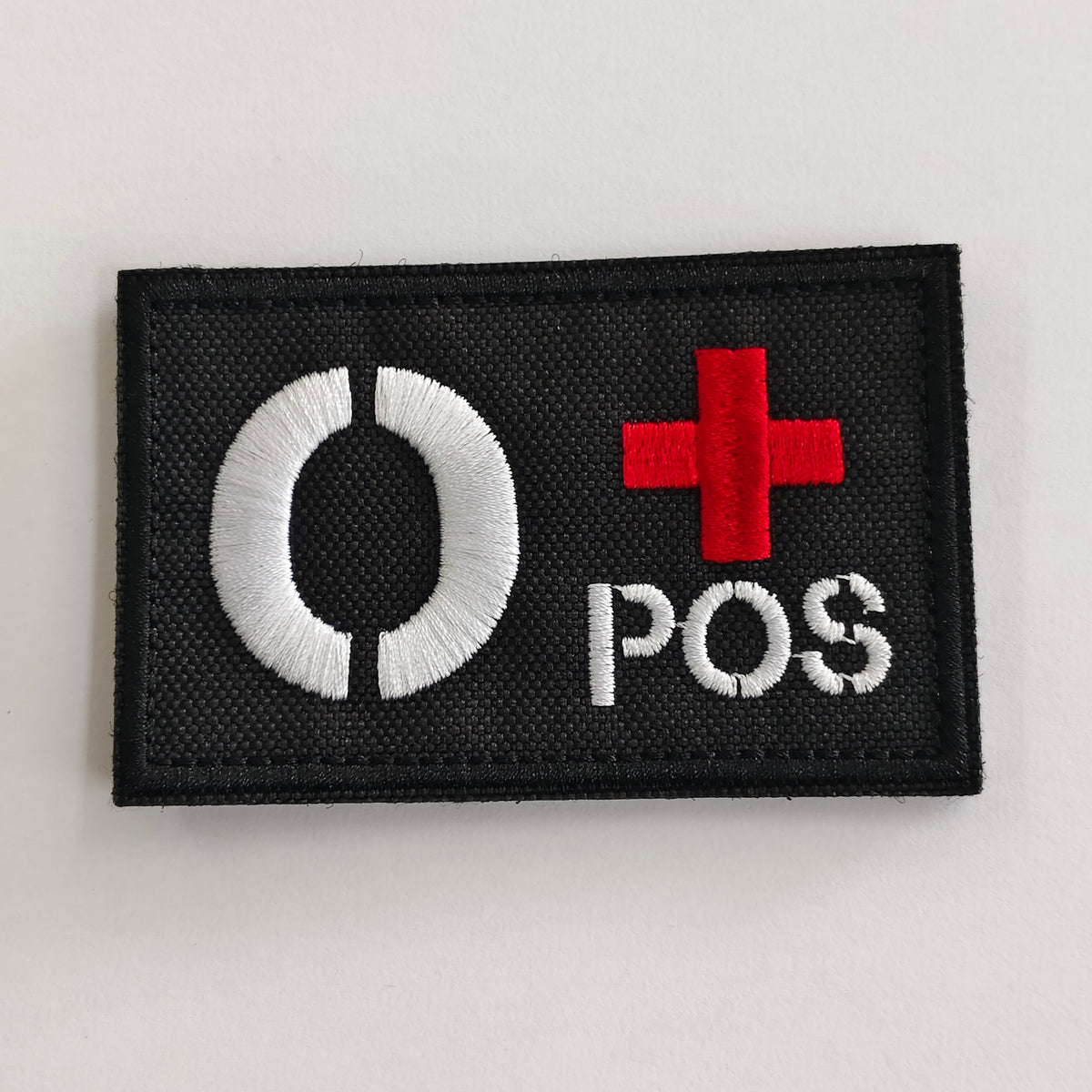 Rubber blood group badge with Velcro backing, product photograph