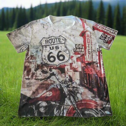 T-shirt with Route 66 design on grass with trees in the background