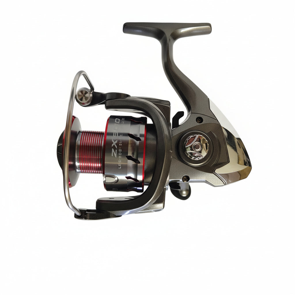 Fishing reel with metallic finish on a white background