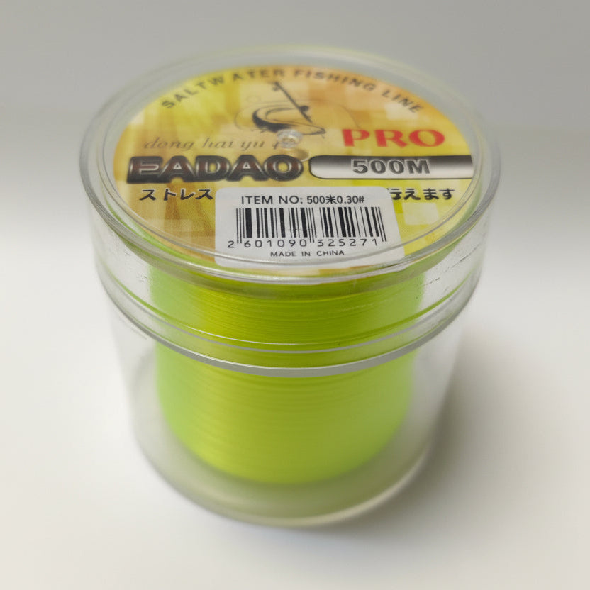 Green fishing line spool in a clear container with 'Badao' branding on a white background