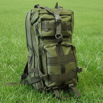 Green tactical backpack on a white surface with a wooden background