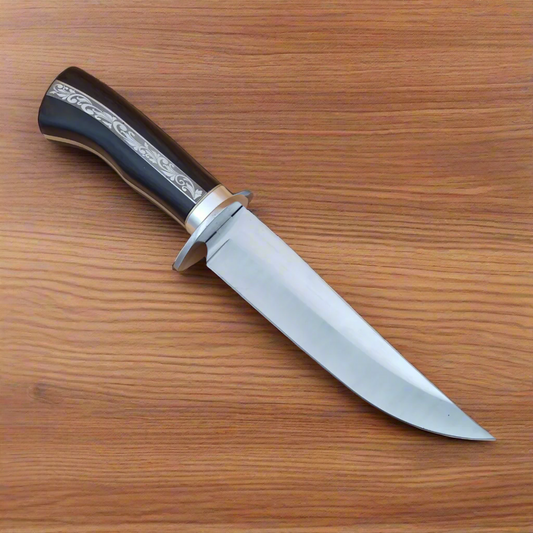 Knife with a black handle on a beige background, featuring 'Blades & Outdoor' logo.