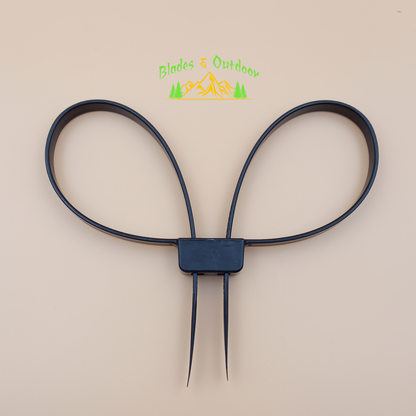 A pair of black handcuffs connected by a zip tie.