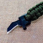 Paracord bracelet with knife and fire starter