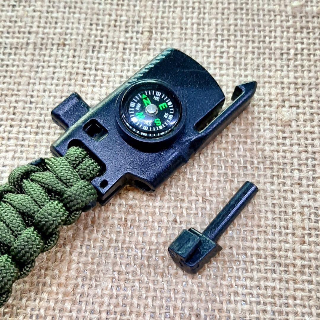 Paracord bracelet with knife and fire starter