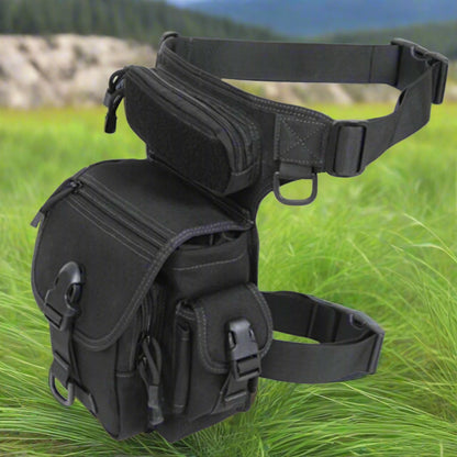 Black tactical pouch on a grassy background