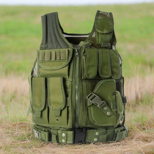 Green tactical vest with multiple pockets and straps on a grassy background