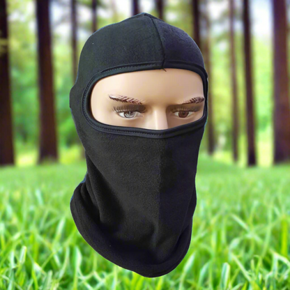 Black balaclava on a mannequin head against a white background